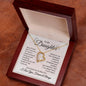 a gift displaying a heartfelt message, The message card reads: Never forget that I love you. If I had to choose between loving and breathing, I would use my last breath to say I love you. Whenever you feel inadequate, unworthy, or unloved, straighten your necklace and remember that I am always there in your heart. You'll always be my bay girl. I love you, forever & always.
