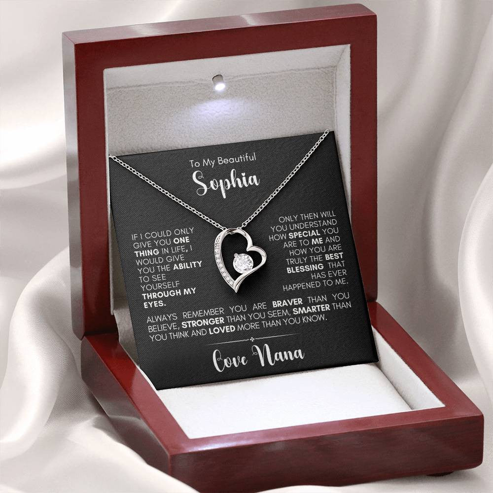 Jewelry mahgony Gift box with LED & Black message card and white gold finish necklace with a heart pendant with a white stone.  message card reads IF I COULD ONLY GIVE YOU ONE THING IN LIFE, I WOULD GIVE YOU THE ABILITY TO SEE YOURSELF THROUGH MY EYES.
ONLY THEN WILL YOU UNDERSTAND HOW SPECIAL YOU ARE TO ME AND HOW YOU ARE TRULY THE BEST BLESSING THAT HAS EVER HAPPENED TO ME. ALWAYS REMEMBER YOU ARE BRAVER THAN YOU BELIEVE, STRONGER THAN YOU SEEM, SMARTER THAN YOU THINK AND LOVED MORE THAN YOU KNOW